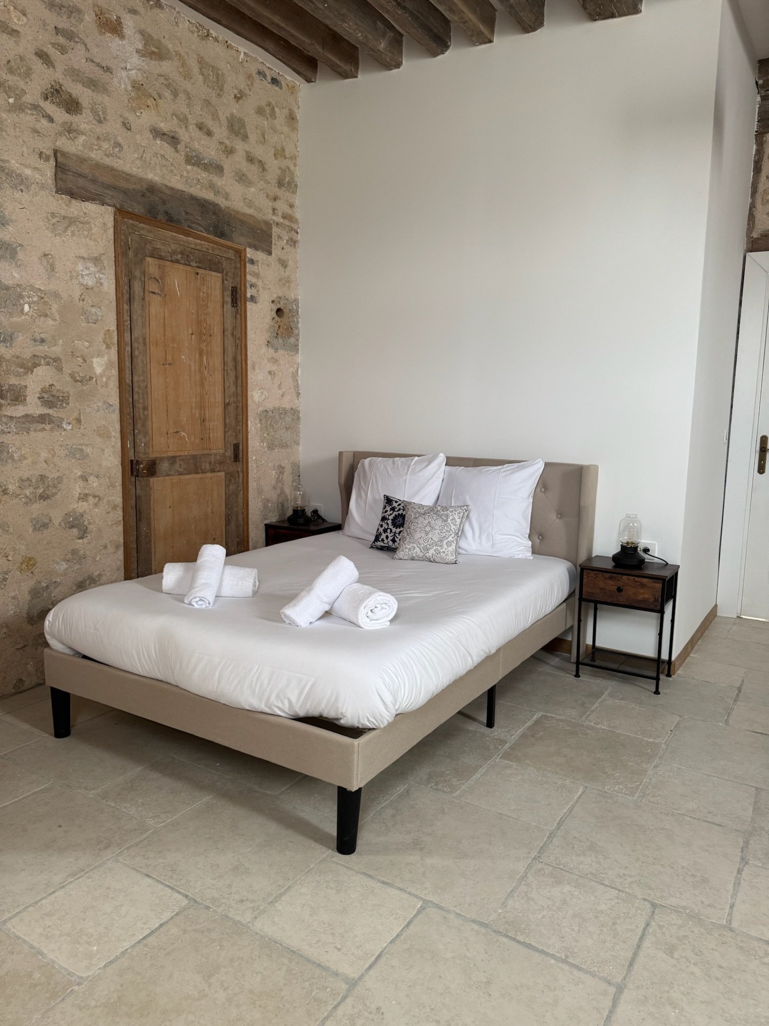 Guest room - double bed, stone walls